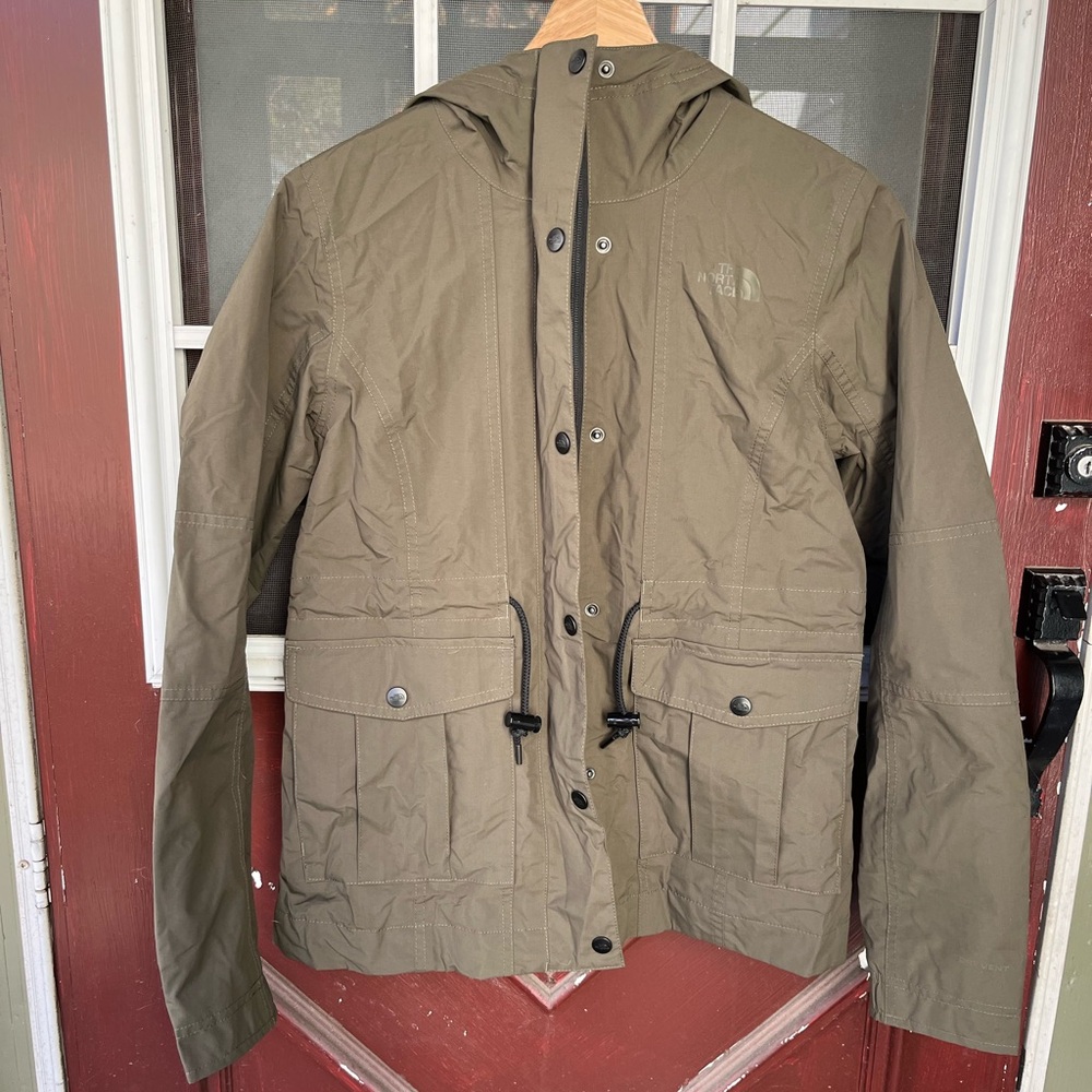The North Face women’s green hooded Rainjacket